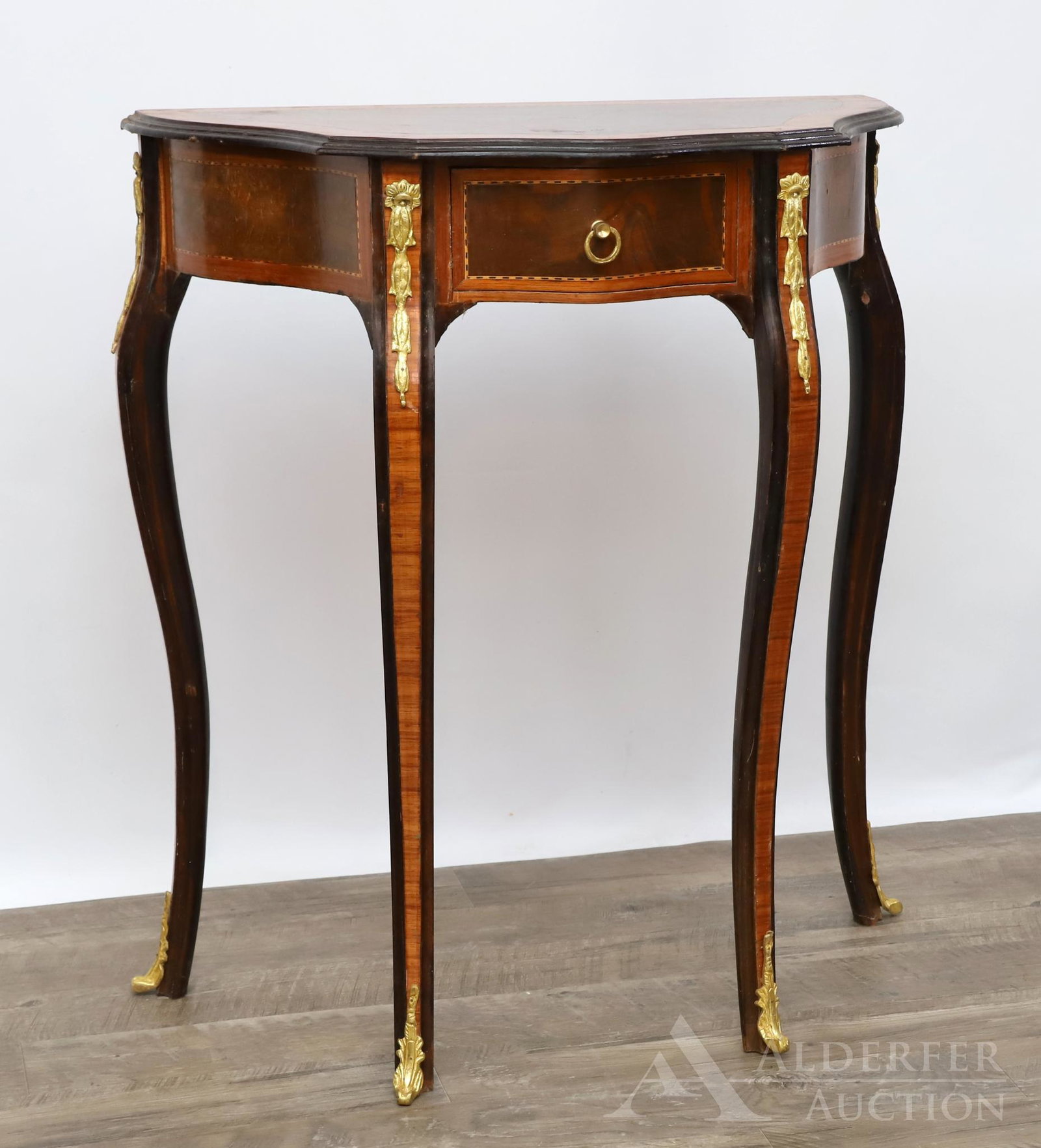 French Ormolu Mounted Rosewood Side Table: Burlwood inset banded inlay serpentine top, one drawer on cabriole legs. 29"h x 26"w x 13"d