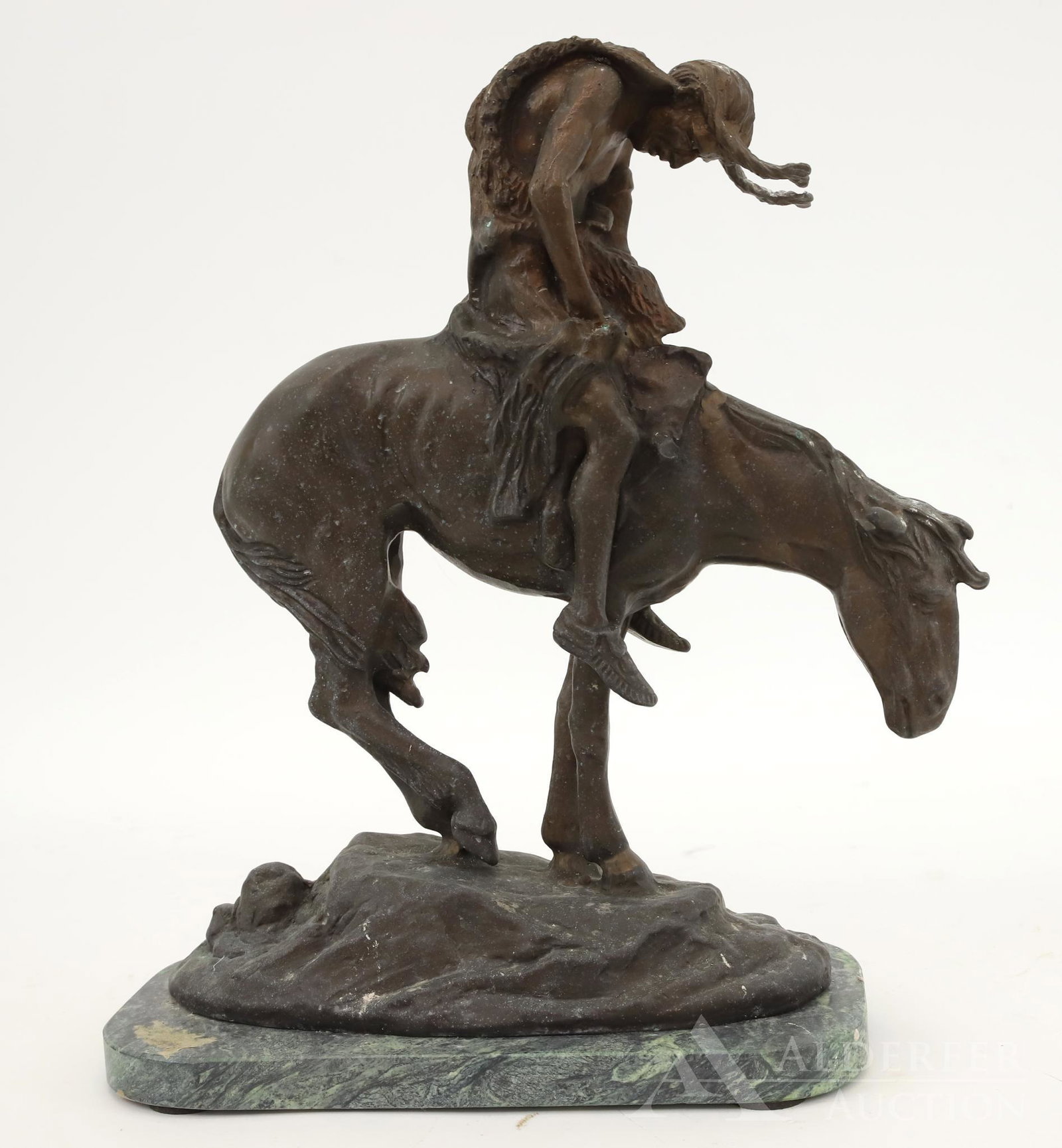 Figural Bronze Sculpture: Bronze depiction of James Earl Fraser's "End of the Trail" on a marble plinth. 13.75"h x 12"w x 5"d