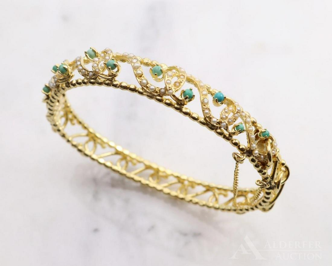 14KY Gold Turquoise and Seed Pearl Bracelet: Hinged bangle with safety chain features (10) round Turquoise beads and multiple Seed Pearls across top. 11mm wide. 2 1/4 x 1 3/4" I.D. 22.1gtw.