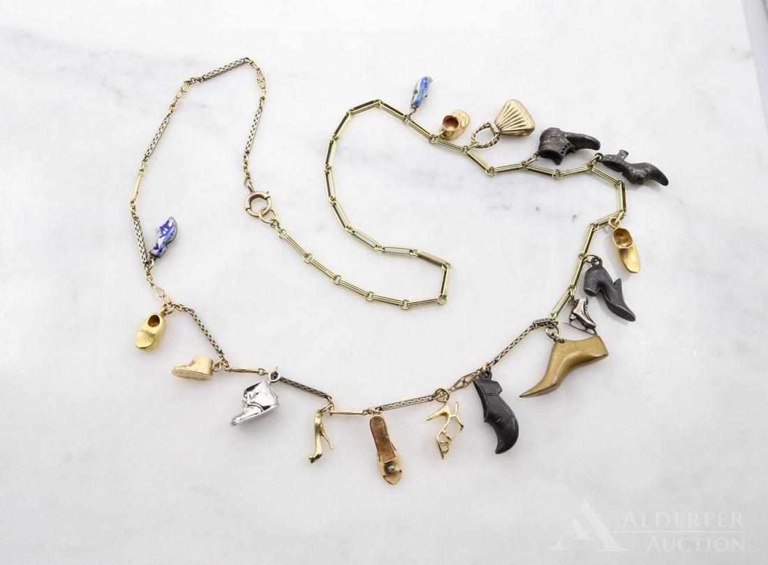 14KY Necklace with Shoes and Purse Charms: Necklace is composed of two separate style chains, a fancy ring and connector style attached to a fancy bar chain. Features (1) 10KY fancy purse charm with etching inside and out, and (15) assorted fo
