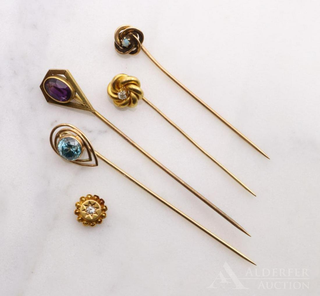 14KY Gold Stickpins and 15KY Top: Including (1) knot with a 2mm round Opal cabochon, (1) knot with a 2.5mm round Diamond, (1) double wire pear shape with a bezel set 6.5mm round blue Zircon, (1) pentagon with an 8 x 5.5mm oval Amethys
