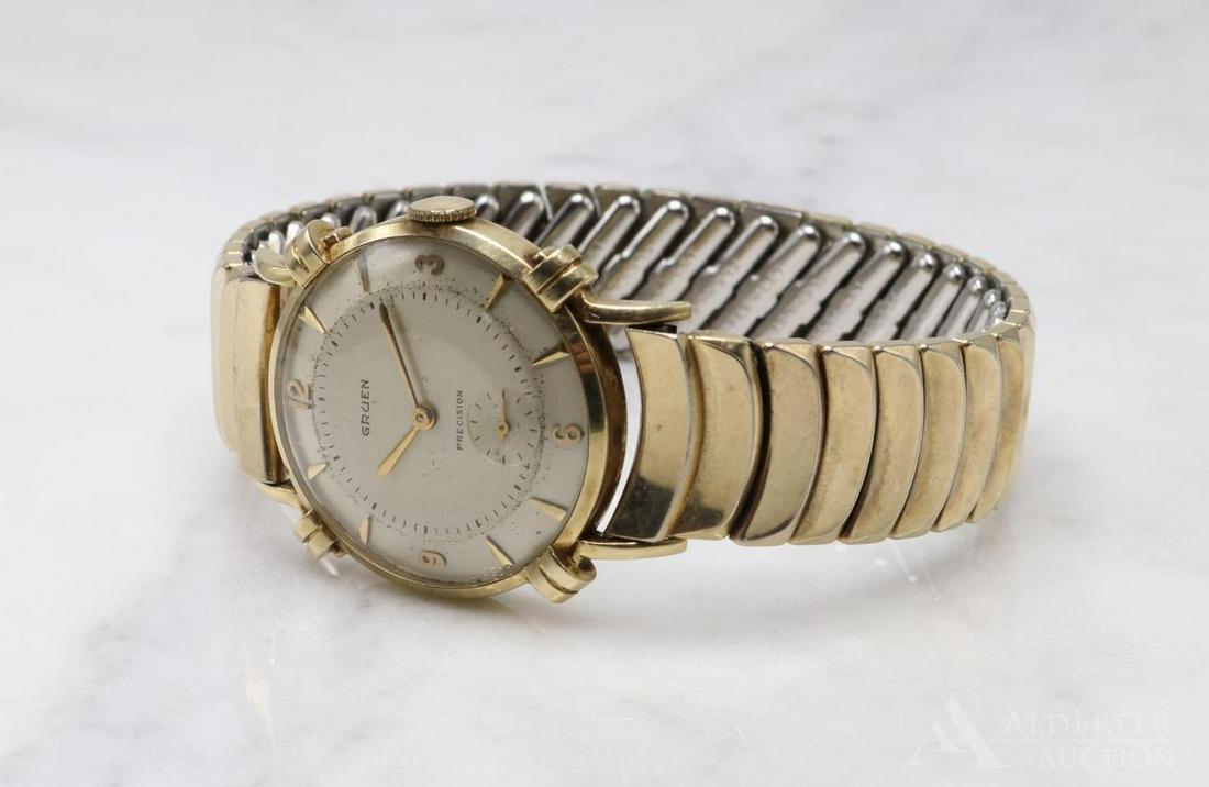 14k Yellow Gold Gents Gruen Precision Wristwatch: Gents 14k yellow gold bezel with gold filled band.