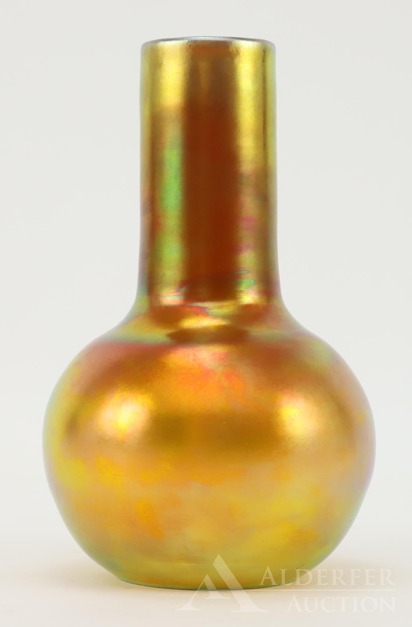Steuben Art Glass Vase: Art glass vase in gold aurene, form #3284. 8"h x 8.5" round