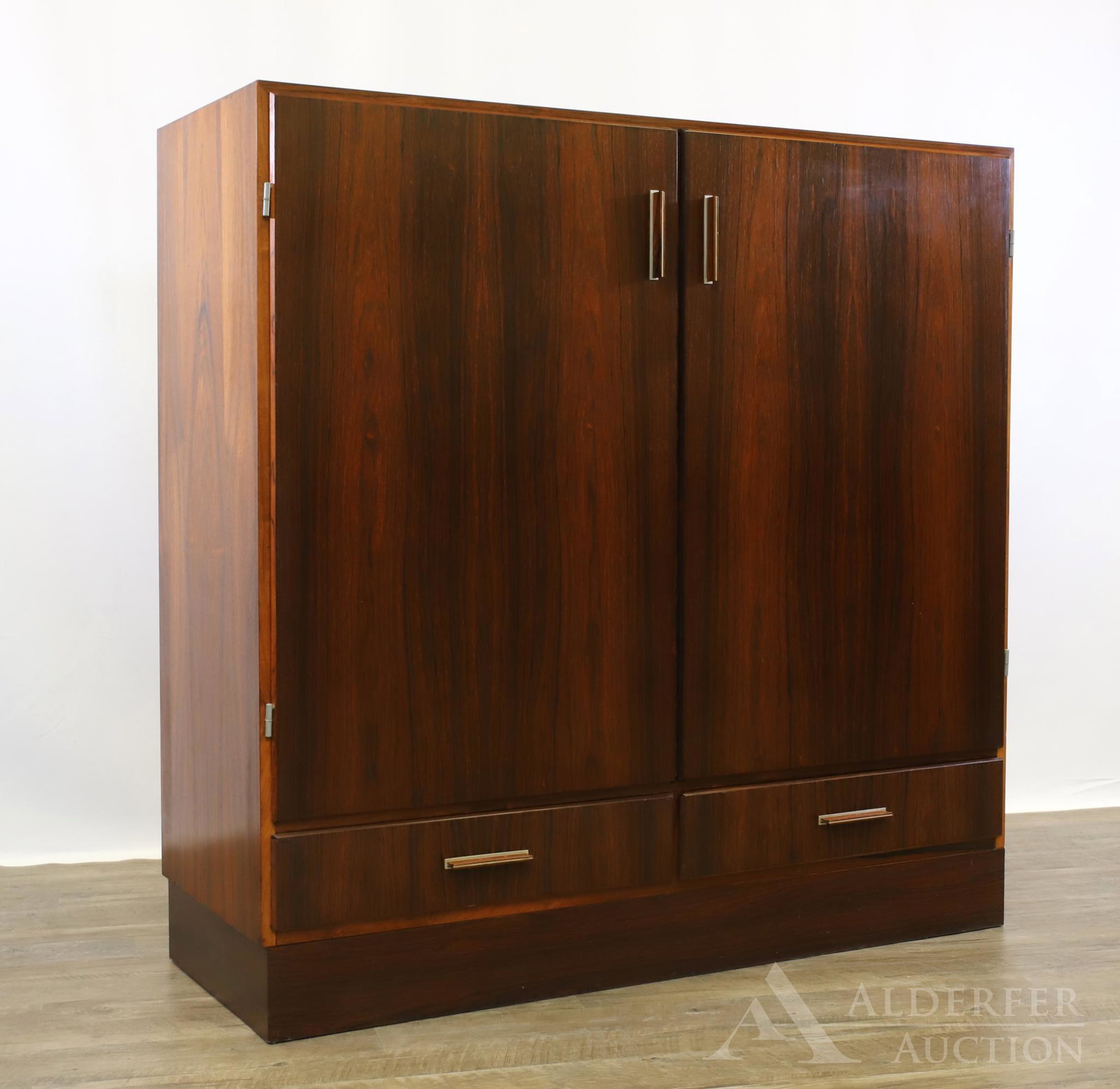 Axel Christiansen Rosewood Dry Bar for ACO Mobler: Two doors opening to fitted interior over two drawers with interior lighting. 47"h x 48"w x 18"d