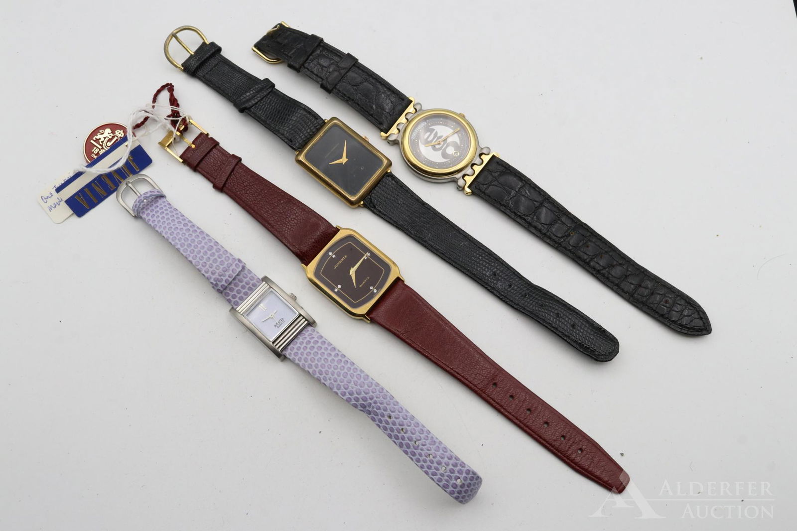 Wristwatches: Grouping includes an assortment of wristwatches of varying styles with makers including Girard Perregaux, Invicta, Juvenia and one unknown with Fred band. largest 34mm