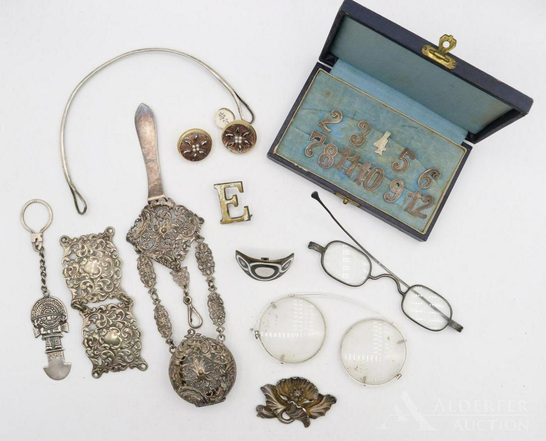 Assorted Jewelry and Accessories: Grouping includes a sterling silver Aztec style keychain, an unmarked chatelain, a clip on brooch, cased set of Alpaca silver numerals (not complete) etc