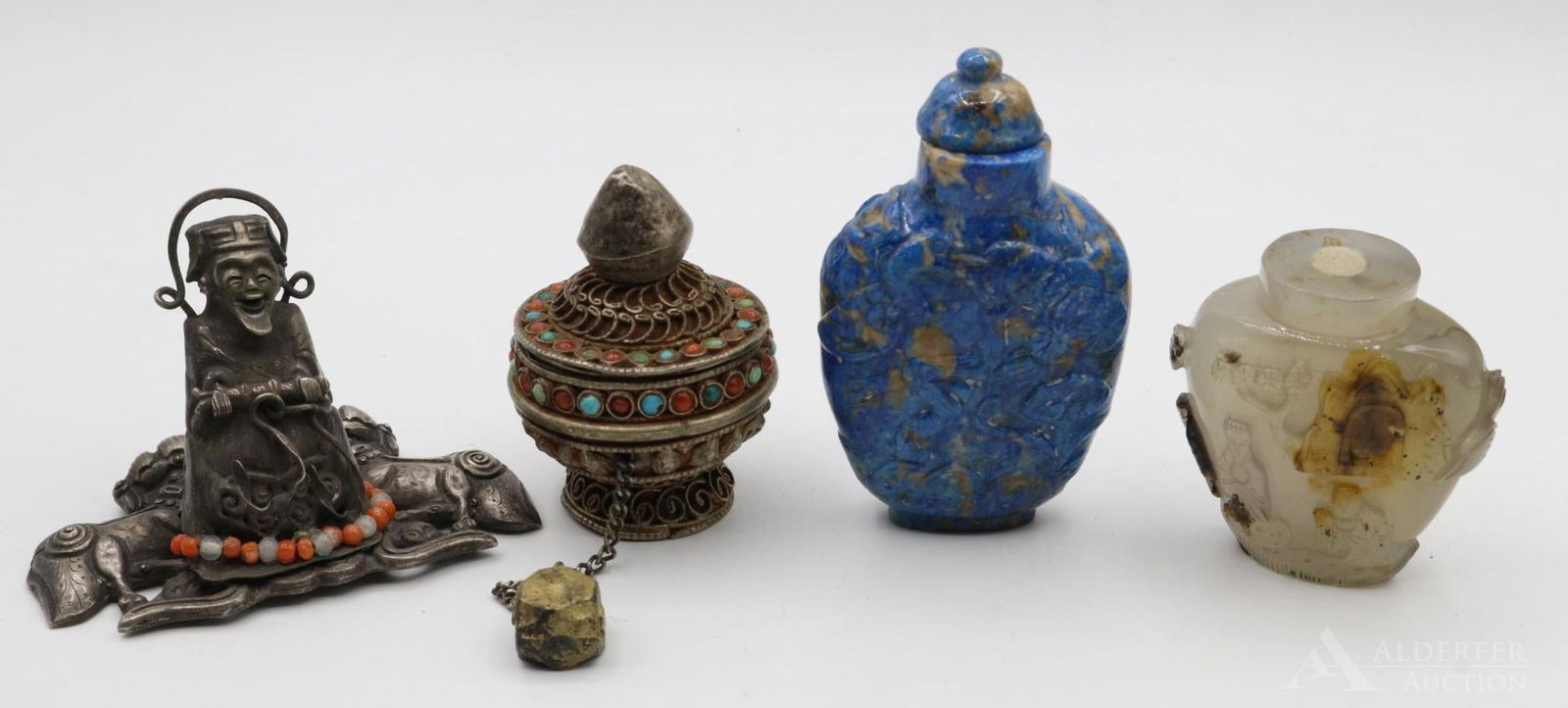 Carved Snuff Bottles: Grouping includes a pair of finely carved snuff bottles (one top missing) and a Tibetan style pill box and figure.