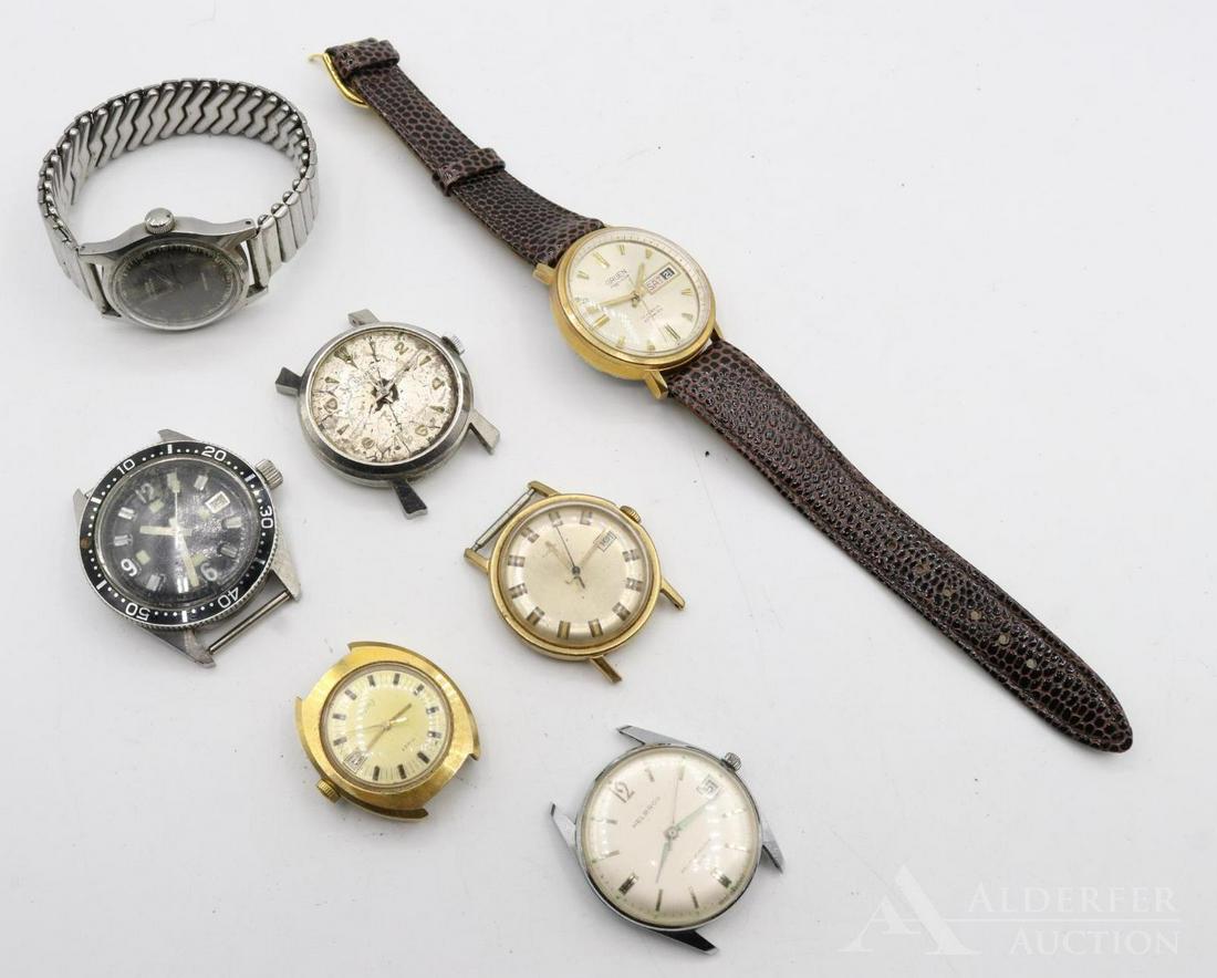 Vintage Wristwatches: Grouping includes examples by Jubilee (skin diver), Helbros, Timex, Gruen automatic, and Winton. All wind and run except for the Timex pair. Largest 41mm
