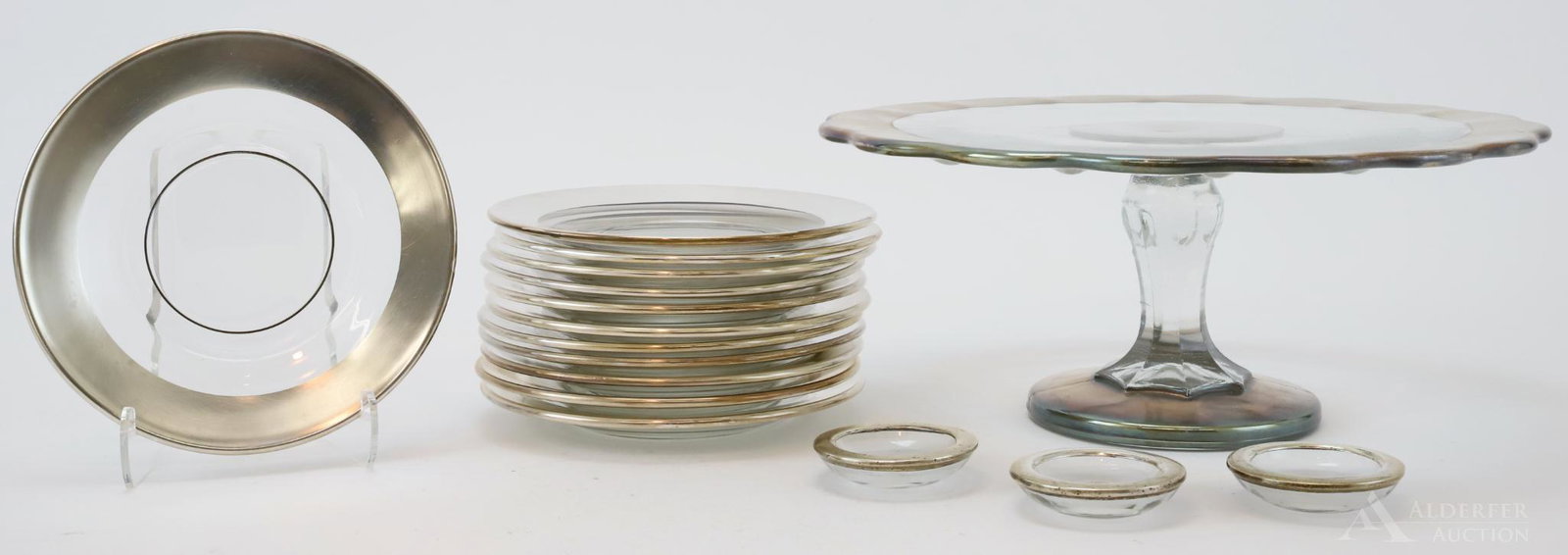 Silver Overlay Cake Stand and Plates: Silver overlay cake stand with 12 dessert plates and 3 salt cellars. 4.5" x 11"