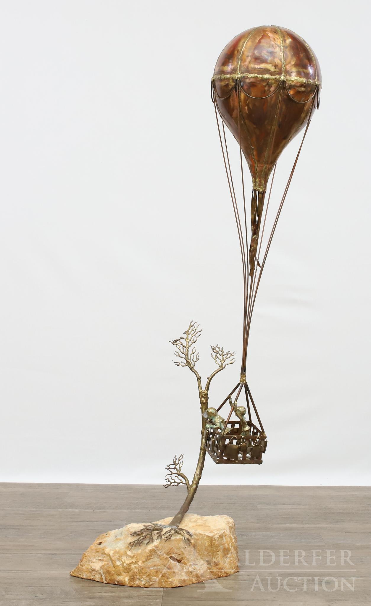 In the Manner of Curtis Jere (1910-2008): Copper sculpture of a hot air balloon with a bronze foliate and figural children motif. Signed illegible and dated '52 on base. 40"h x 14"w x 8"d