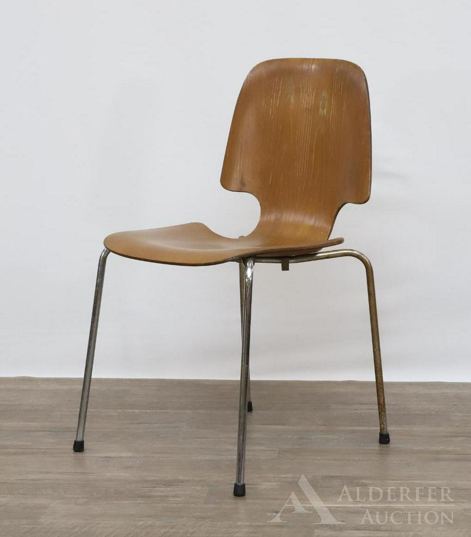 Mid Century Modern Chair: Birch bent walnut plywood side chair on steel legs. 32"h x 17.5"w x 19"d