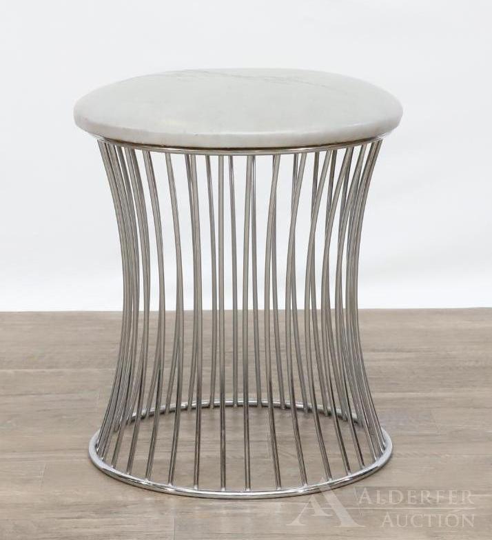 In the Manner of Warren Platner: Vinyl cushion top over a steel chromed curved cylinder cage base. 18"h x 15.5"round