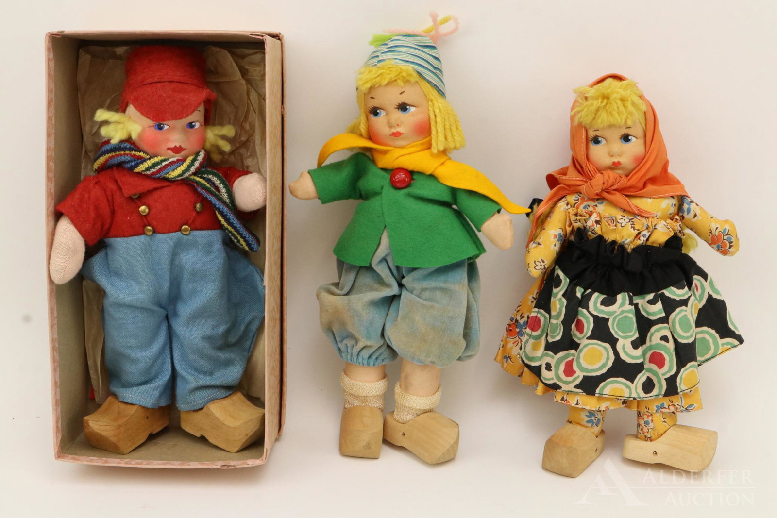 LOT OF CLOTH DOLLS.: Lot of (3) Molly-es type mask face dolls. 11" Unmarked Dutch Boy in OB. Pair of 11" unmarked Georgene? Dutch Boy and Girl dolls. Girl has the printed cloth body that matches her clothing. All have the