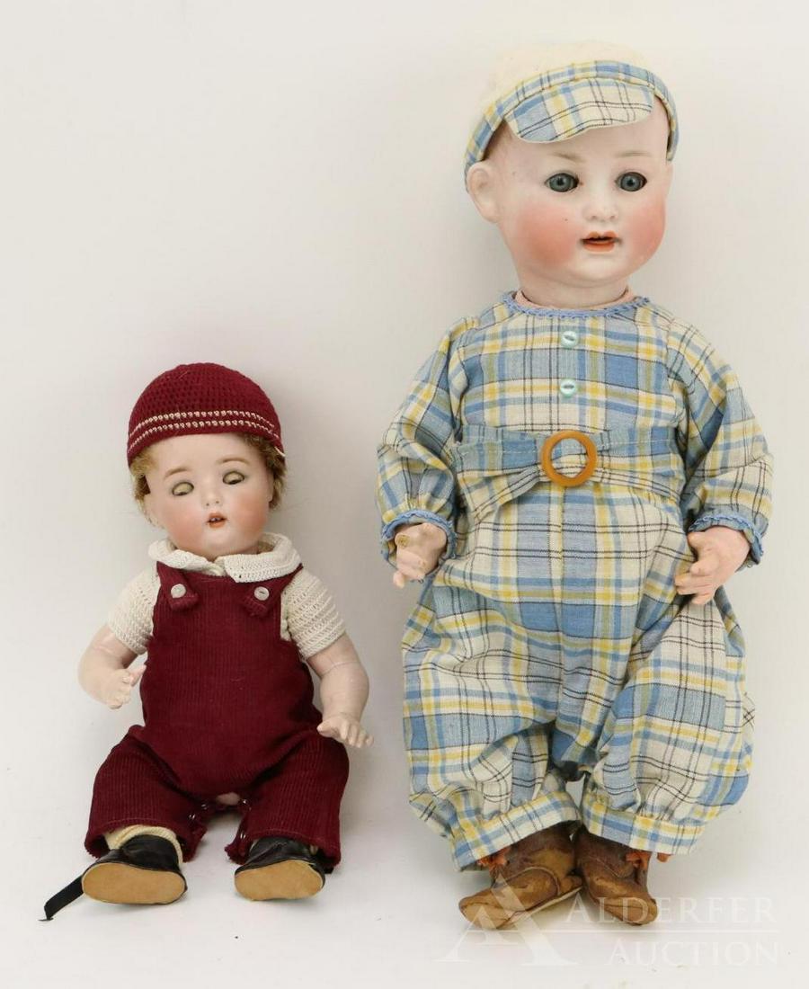 LOT OF GERMAN BISQUE HEAD BABY DOLLS.: Pair of character dolls. Both have 5 pc. papier mache bent limb baby bodies, sleep eyes, open mouths. 10" S & H 1299 3 1/2. Blue eyes, brown human hair wig, pierced ears. Dressed in vintage overalls,