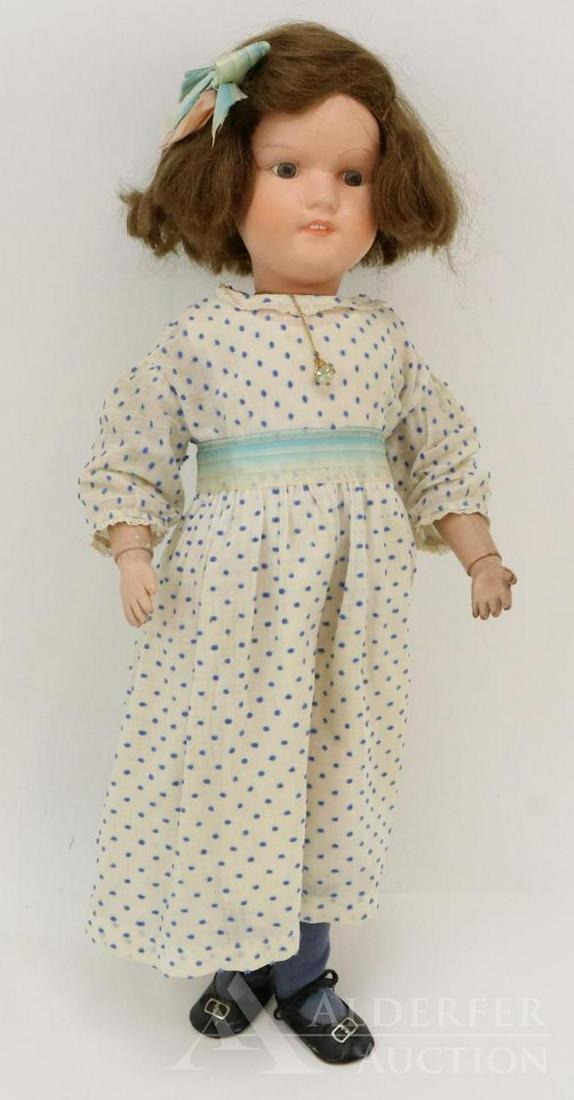 SCHOENHUT LOT.: 19 1/2" "Miss Dolly" No. 316. Doll has the incised marked on back of torso. Replaced brown human hair wig. Painted eyes, open mouth with four teeth showing. Dressed in replaced vintage/antique clothin