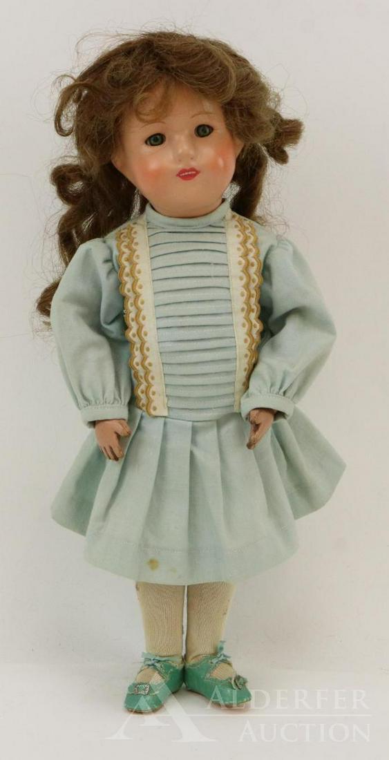 SCHOENHUT LOT.: 15" Model No. 317. Doll has the decal on back of torso. Blue SLEEP eyes, open mouth with teeth showing. Replaced long brown curly human hair wig. Dressed in vintage clothing, reproduction union suit, 