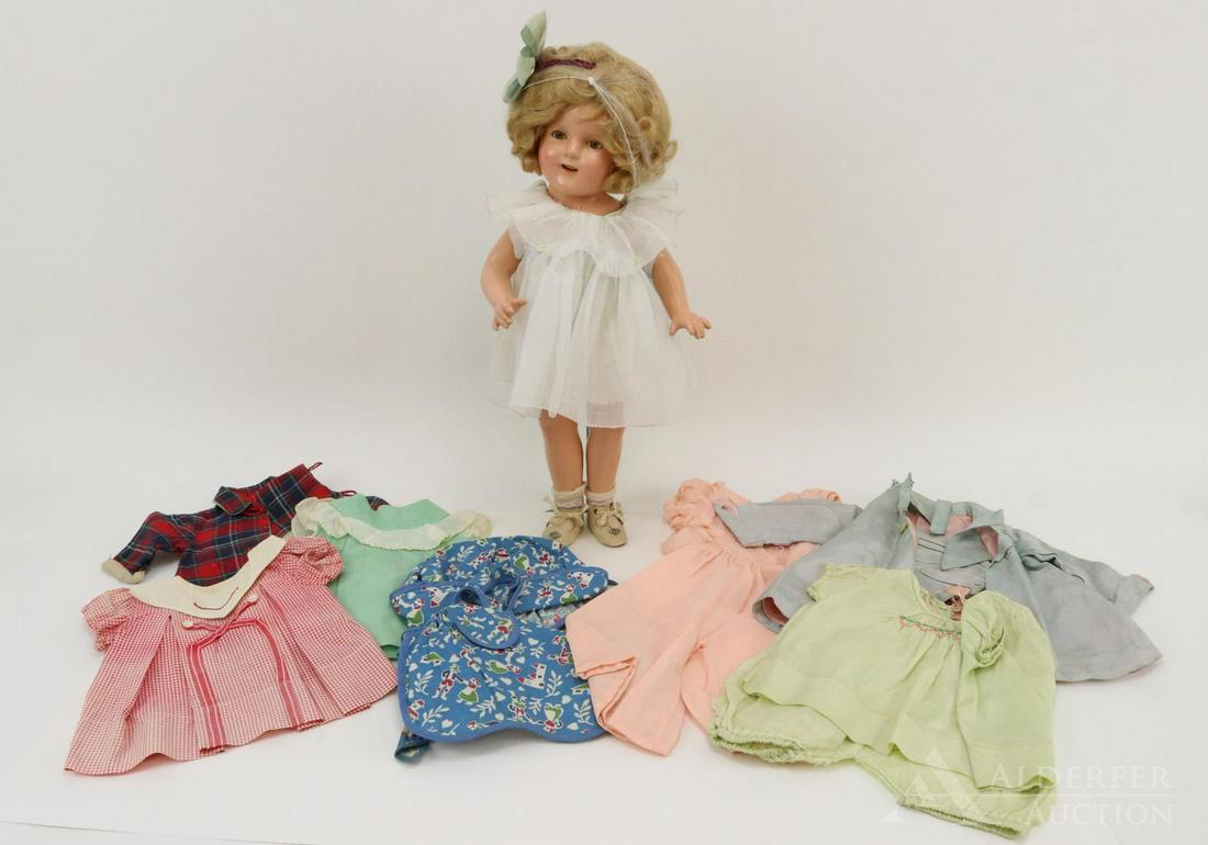 LOT OF COMPOSITION DOLL(S).: 17" Ideal Shirley Temple doll in vintage clothing. Organdy dress, 1 pc. undergarment, ivory oilcloth shoes. Comes with wardrobe of the period. Condition: sleep eyes still have good color. Wig has been