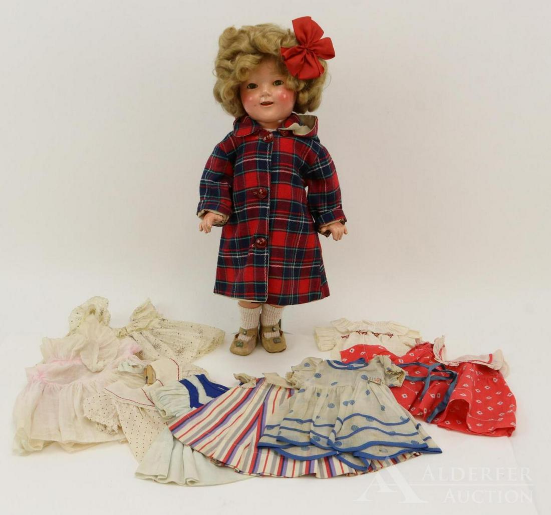 LOT OF COMPOSITION DOLL(S).: 18" Ideal Shirley Temple doll in vintage clothing. Reversible plaid raincoat with detachable hood, underwear, ivory oilcloth shoes. Comes with wardrobe of the period: TAGGED Shirley Temple blue polka