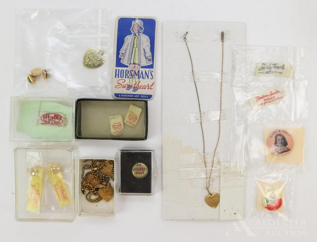 LOT OF COMPANY TAGS, PINS, ETC. FOR DOLLS.: Factory original items for marking vintage dolls/animals. EFFANBEE - (4) 1930's heart doll bracelets. 1930's EFFANBEE child's heart necklace. (2) Cloth EFFanBEE Durable Doll tags. (1) Cloth EFFanBEE D