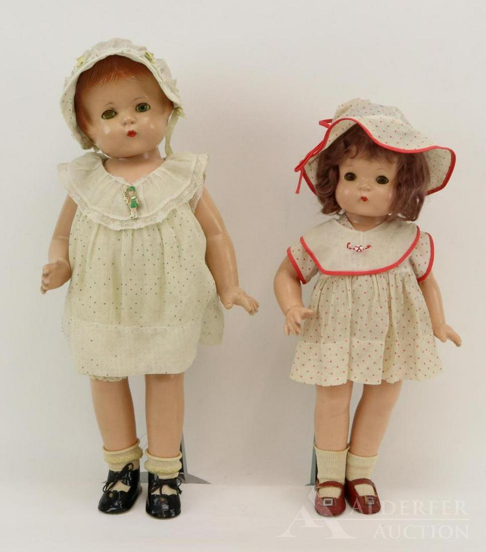 LOT OF COMPOSITION DOLL(S).: Pair of Effanbee Patsy Family dolls. Doll 1) 22" Effanbee Patsy Lou with painted red hair, green sleep eyes. Dressed in vintage green polka dot dress with matching bonnet; underwear. Newer shoes. Cond