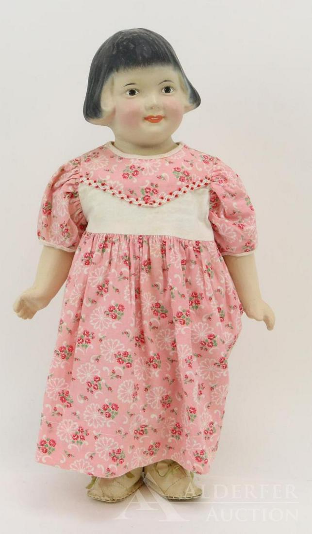 LOT OF COMPOSITION DOLL(S).: 19" "Baby Peggy " doll. Ca 1928, made by the Louis Amberg & Son Co. Molded shoulder head doll with dark brown bobbed hair and painted features. Cloth body with composition lower arms. Dressed in vinta