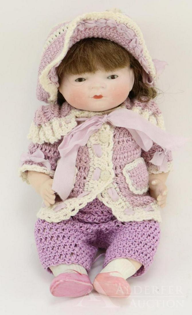 LOT OF ALL BISQUE DOLL(S).: 8" 19/50 COPY. BY GRACE S. PUTNAM GERMANY (Byelo Baby). Brown sleep eyes, brown human hair wig. 5 Pc. bent limb baby body with painted pink shoes, socks. Dressed in 3 pc. lavender crocheted outfit. Co