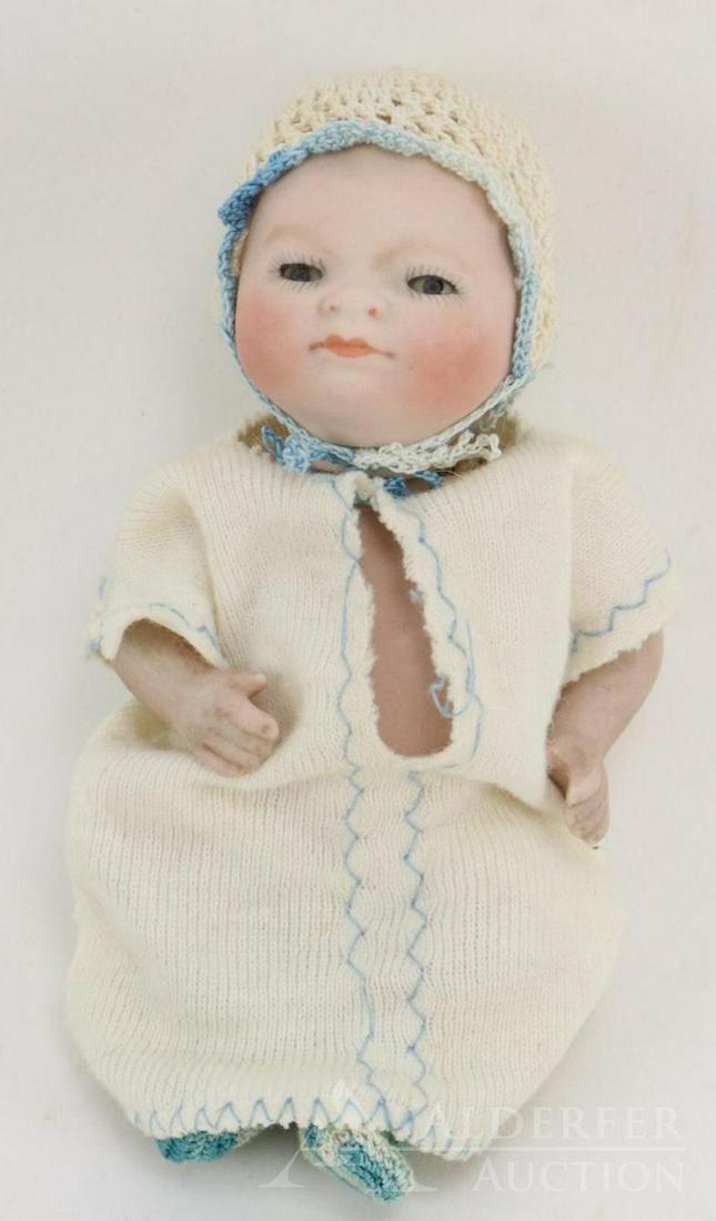 LOT OF ALL BISQUE DOLL(S).: 5" 6-12 COPY. BY GRACE S. PUTNAM GERMANY (Byelo Baby). Blue sleep eyes, painted blonde hiar. Swivel neck with 5 pc. bent limb baby body. Dressed in crocheted cap and booties; little night shirt. Condi