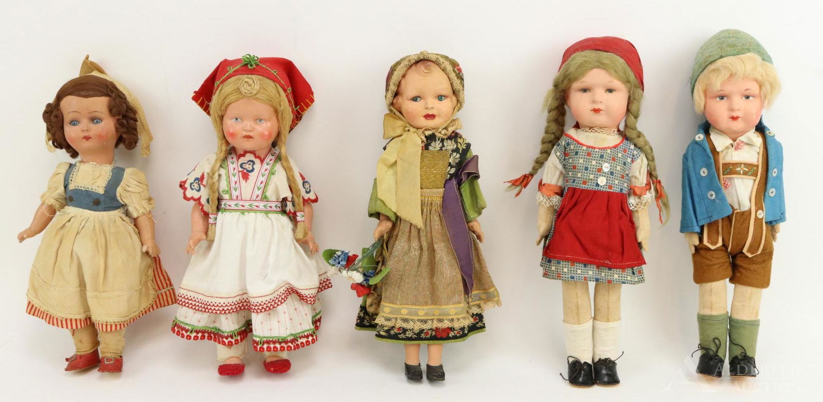 LOT OF DOLLS REPRESENTING OTHER COUNTRIES.: Lot of (5) dolls. All of the dolls' costumes appear to be original. Doll heads are either papier mache, composite or celluloid. 5 Pc. bodies are either cloth, composition or celluloid. 12" Girl has sl