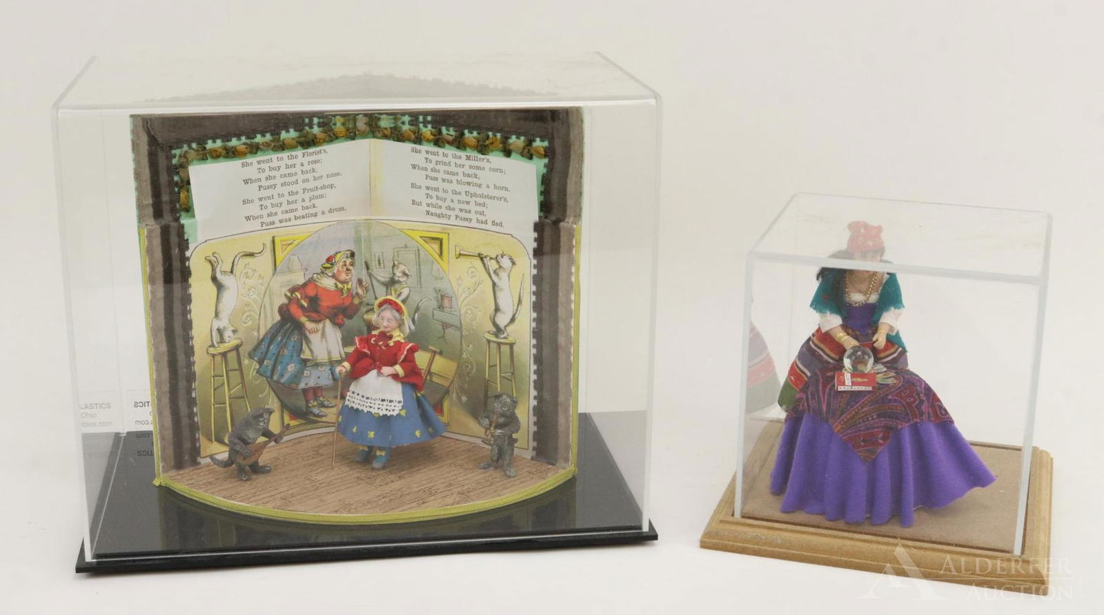 LOT OF MINIATURES IN BOXES.: Pair of boxes on bases. Box 1) 5 1/4" square. Scene of 5" sculpted Gypsy woman standing behind draped table. Tarot cards, crystal ball and book on palmistry on table. Box 2) 8" T x 10" W x 6" D. Scene