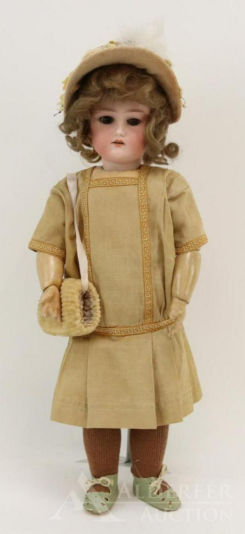 ANTIQUE GERMAN BISQUE HEAD DOLL.: 19" GERMANY C 3 (with oval cutout on back of head). Brown sleep eyes, open mouth, brown mohair wig. Papier mache ball jointed body. Dressed in antique gold cotton drop waist dress, gold pantaloons, co