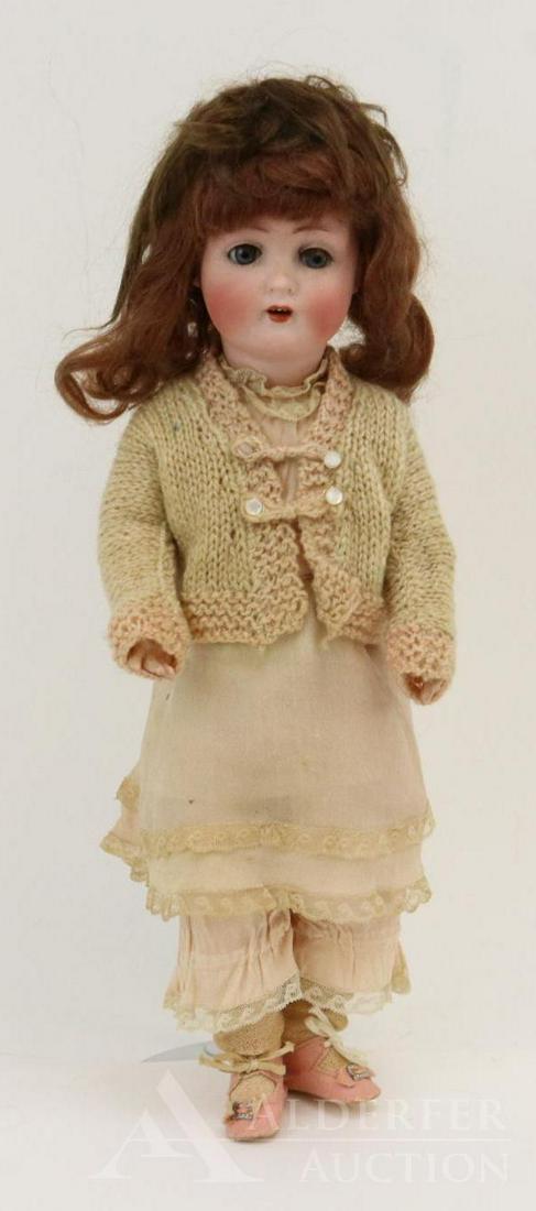 ANTIQUE GERMAN BISQUE HEAD DOLL.: 14" ABG 1362 MADE IN GERMANY 2/0. Blue sleep eyes, open mouth, pierced ears, two-tone brown mohair wig. Papier mache ball jointed flapper style body. Dressed in antique clothing - pastel silk pongee d