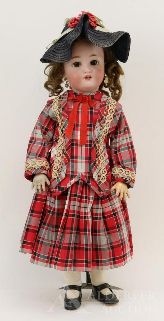 ANTIQUE GERMAN BISQUE HEAD DOLL.: 18" C M BERGMANN SIMON & HALBIG 6 1/2. Brown sleep eyes, open moulth, pierced ears, brown curly mohair wig. Papier mache ball jointed body. Dressed in attractive reproduction taffeta plaid 2-pc. dress