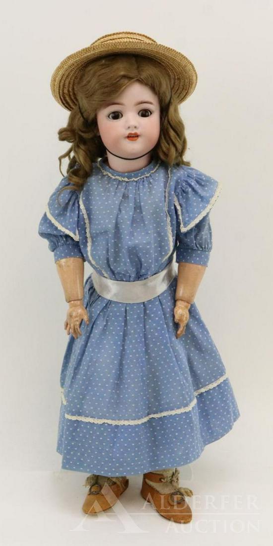 ANTIQUE GEMAN BISQUE HEAD DOLL.: 21" 550 GERMANY HALBIG S & H doll. Brown sleep eyes, open mouth, long brown curled mohair wig. Papier mache ball jointed body. Dressed in vintage blue/white dotted Swiss dress. Antique petticoat, pant