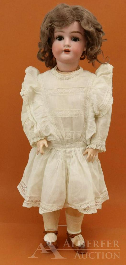 ANTIQUE GERMAN BISQUE HEAD DOLL.: 23" PANSY I GERMANY doll. Brown sleep eyes, open mouth, brown mohair wig. Papier mache ball jointed body. Dressed in antique white cotton clothing: drop waist dress, petticoat, pantaloons. Rust leathe