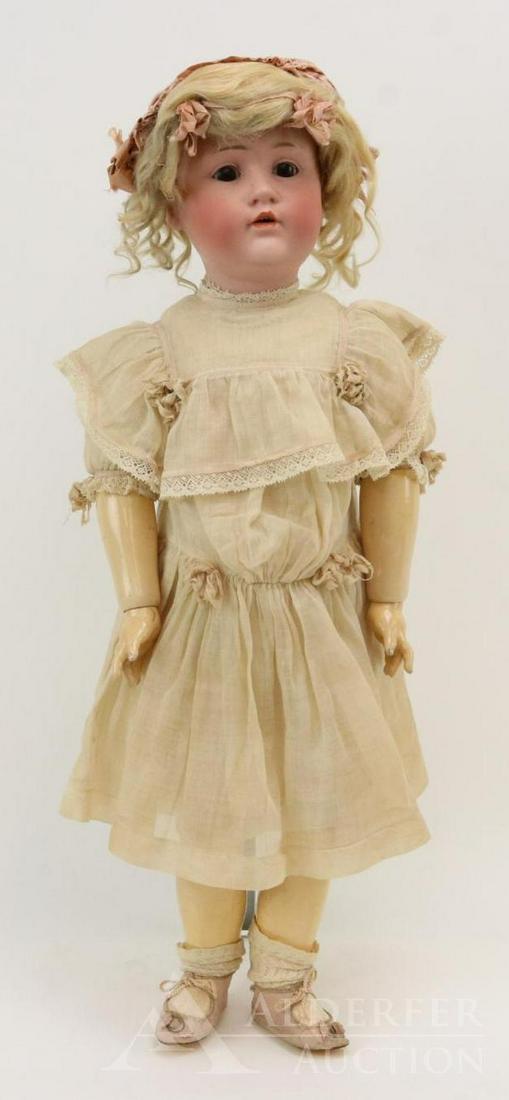 ANTIQUE GERMAN BISQUE HEAD DOLL.: 23" H. MADE IN GERMANY 12 J.D.K. 249 character doll. Brown sleep eyes, open mouth, blonde mohair wig, plaster pate. Papier mache ball jointed body. Dressed in antique cotton organdy dress with Bertha