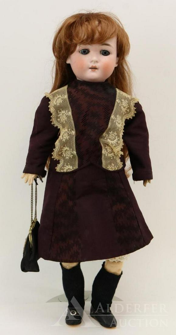 ANTIQUE GERMAN BISQUE HEAD DOLL.: 24 1/2" D A 6 doll. Blue sleep eyes, open mouth, synthetic wig. Papier mache ball jointed body. Dressed in antique 2 pc. dark red faille outfit with lace trim. Cotton petticoat, pantaloons. Black oilc