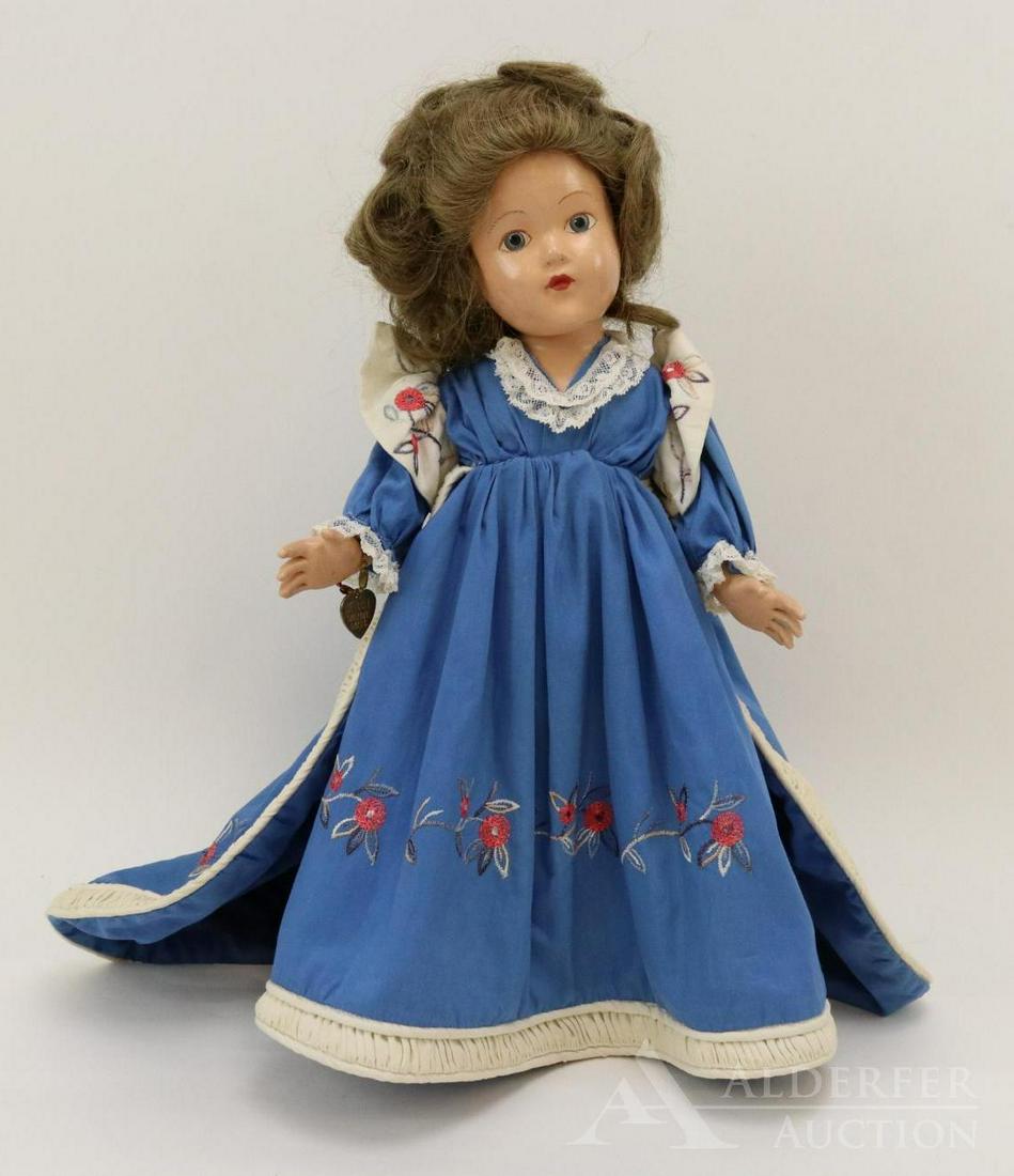 COMPOSITION EFFANBEE HISTORICAL DOLL.: 14" 1939 All original "1804 Louisiana Purchase" doll. Painted blue eyes, brown human hair wig. Blue, elaborately embroidered, cotton dress with train. Petticoat, pantaloons, ivory oilcloth shoes. Bras