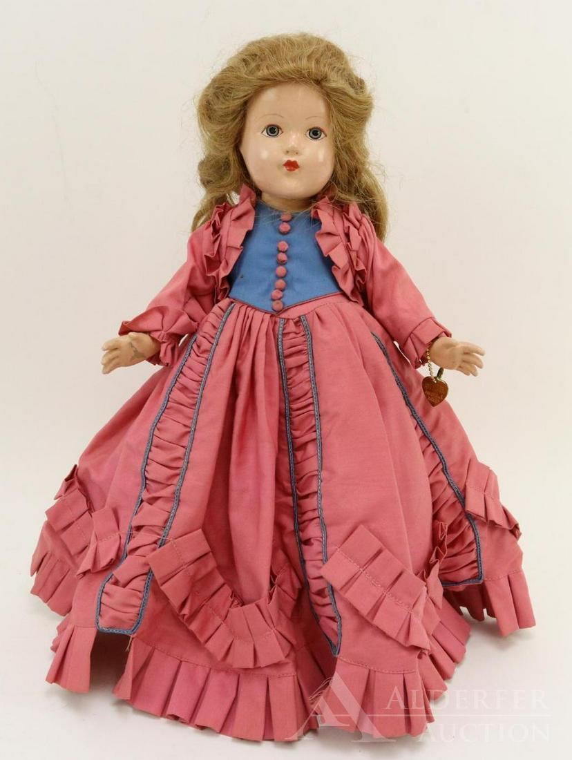 COMPOSITION EFFANBEE HISTORICAL DOLL.: 14" 1939 All original "1864 Civil War Period" doll. Painted blue eyes. Honey blonde human hair wig. Rose pink cotton dress, blue bodice and separate jacket. Ruching trim. Petticoat, pantaloons. Ivory