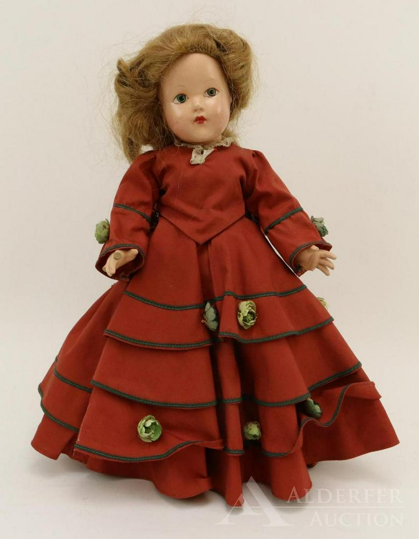 COMPOSITION EFFANBEE HISTORICAL DOLL.: 14" 1939 All original "1872 Economic Development" doll. Painted blue eyes. Honey blonde human hair wig. Dressed in rust cotton 2 pc. dress with tiered skirt, bodice. Floral and green soutache trim. Pe