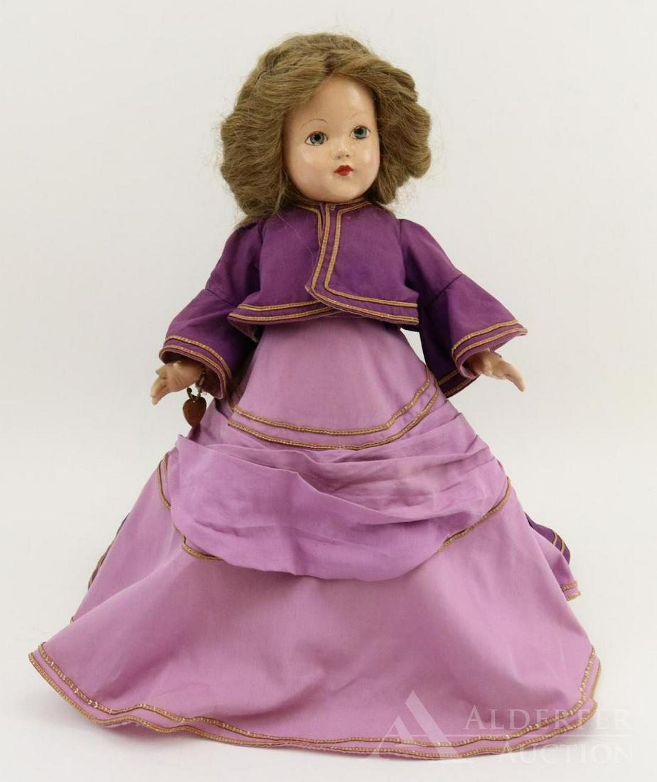 COMPOSITION EFFANBEE HISTORICAL DOLL.: 14" 1939 All original "1873 Industrial South" doll. Painted blue eyes. Honey blonde human hair wig. Dressed in 2 pc. lavender and purple dress with train; separate jacket, gold soutache trim. Petticoa