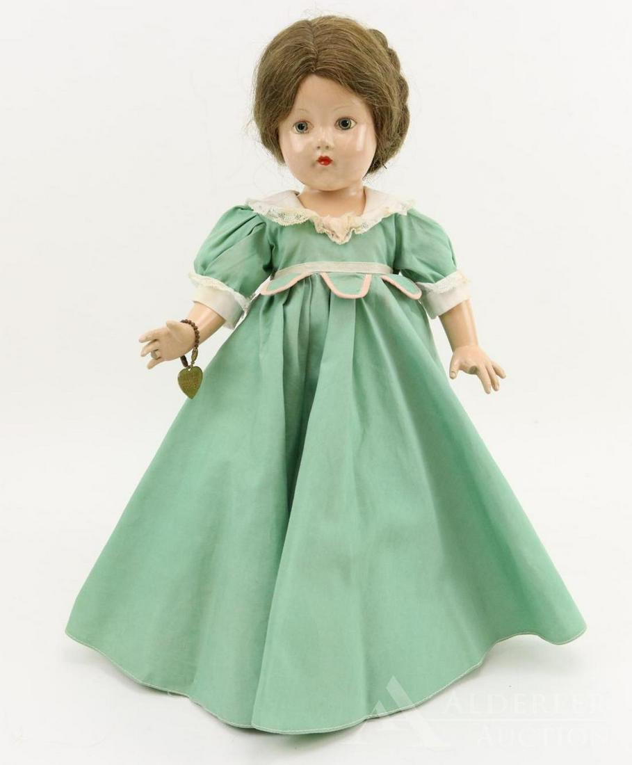 COMPOSITION EFFANBEE HISTORICAL DOLL.: 14" 1939 All original "1608 Virginia Colony" doll. Painted blue eyes, Brown braided human hair wig. Dressed in light green cotton dress with pink trim. Petticoat, pantaloons. Black oilcloth shoes. Bra