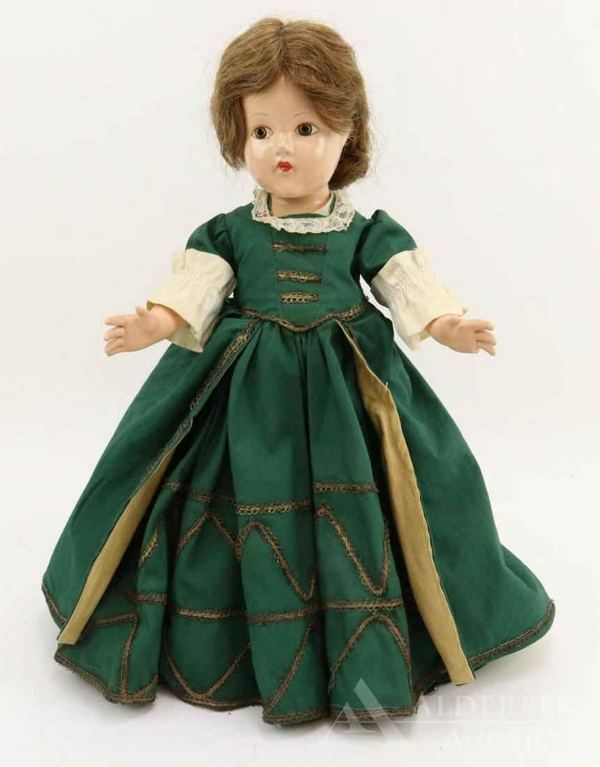 COMPOSITION EFFANBEE HISTORICAL DOLL.: 14" 1939 All original "1658 Carolina Settlement" doll. Painted brown eyes, brown human hair wig. Dark green cotton dress with gold reverse. Metallic braid trim. Petticoat, pantaloons. Black oilcloth s