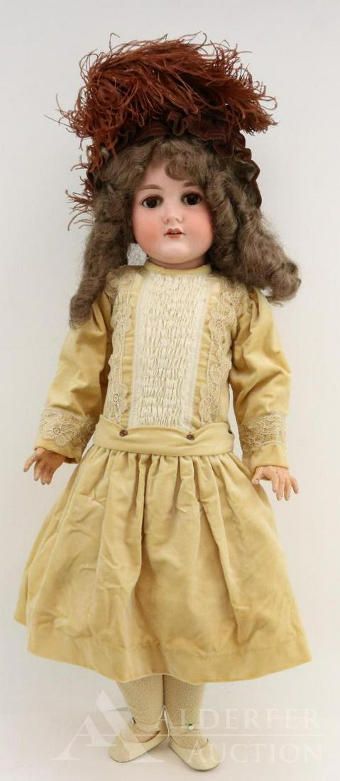 ANTIQUE GERMAN BISQUE HEAD DOLL.: 28" C.M. BERGMANN WALTERHAUSEN 1916 12. doll. Brown sleep eyes with fluffy lashes, open mouth, synthetic brown wig. Papier mache ball jointed body. Dressed in vintage ivory velveteen dress with smocke
