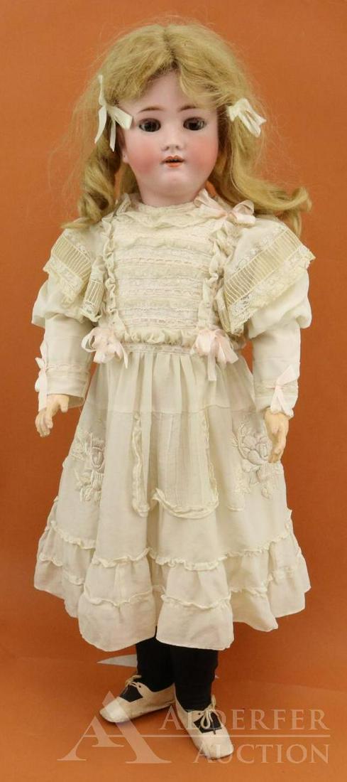 ANTIQUE GERMAN BISQUE HEAD DOLL.: 28" GERMANY HEINRICH HANDWERCK SIMON & HALBIG 5 1/2 Doll. Brown sleep eyes with fluffy lashes, open mouth, pierced ears, honey blonde human hair wig. Papier mache ball jointed body. Dressed in an outf