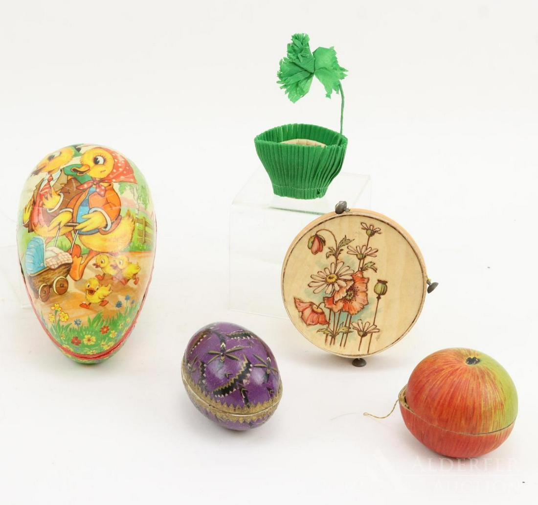 LOT OF HOLIDAY/NOVELTY.: Lot of papier mache candy containers. 5 1/2" West German Easter Egg. 3" German Easter Egg. 2 1/2" Apple. St. Patrick's Day Candy Cup. 3 1/2" Fancy Tambourine. Condition: this lot is being sold AS IS.
