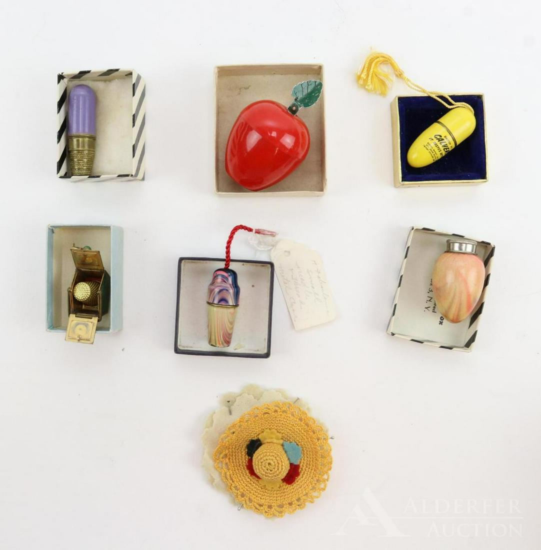 LOT OF HOLIDAY/NOVELTY.: Lot of vintage sewing items. Thimble/spool holders, pin holder, tape measure.