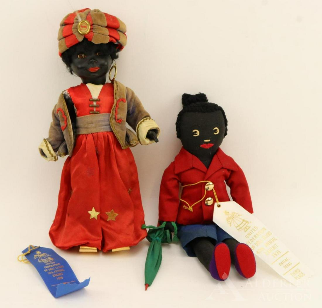 LOT OF BLACK DOLLS.: Pair of 14 1/2" male dolls. Doll 1) is handmade from black cotton sateen. (1950's?) He has embroidered features, black curly wool hair. Dressed in cotton clothing - red blazer, blue Bermuda shorts, gr