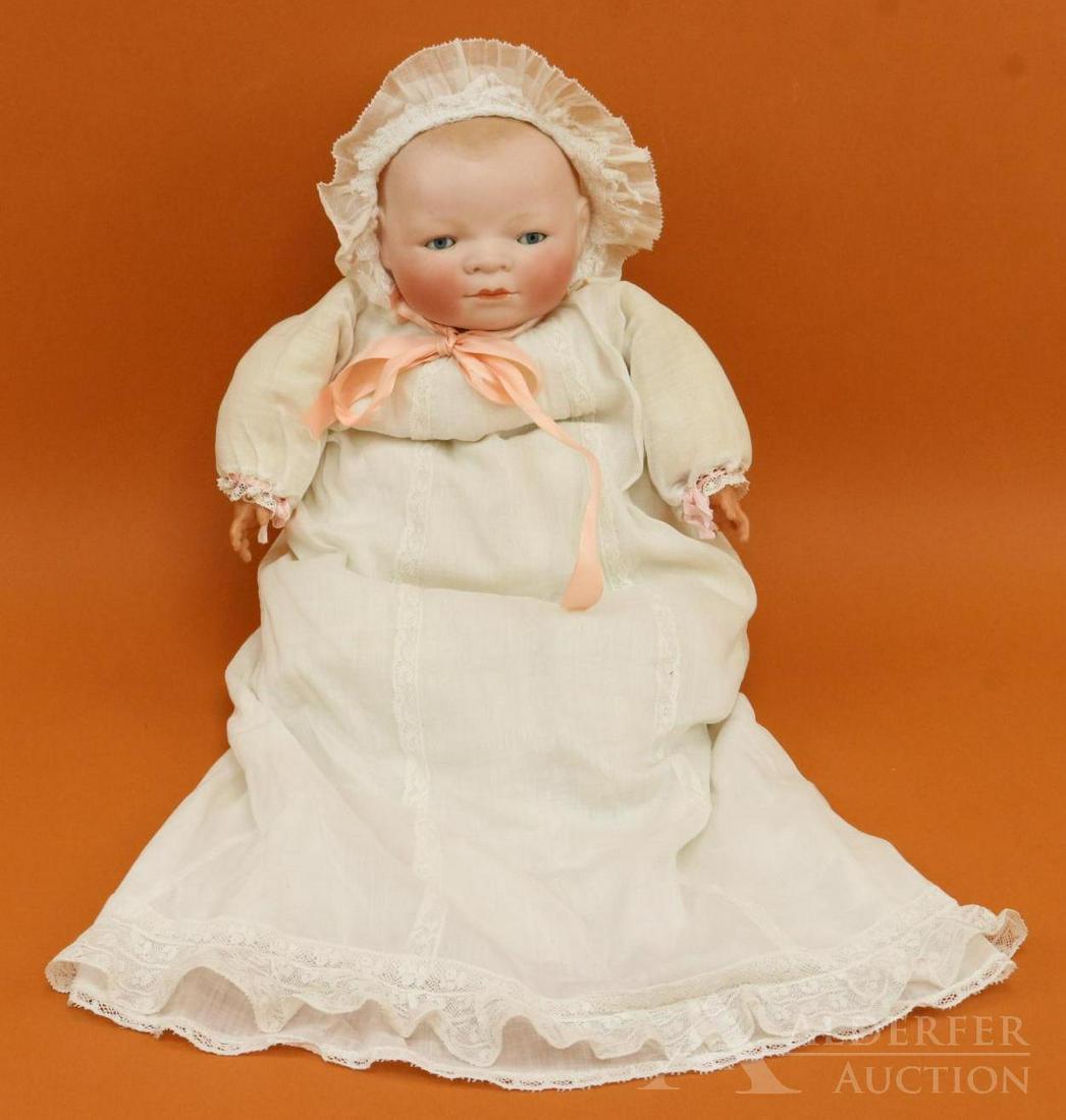 BYELO BABY LOT.: 17" L, 13 1/2" cir. Bisque head doll marked COPR. BY GRACE S. PUTNAM MADE IN GERMANY. Blue sleep eyes, dark blonde painted hair, celluloid hands. (Two fingers missing, left hand.) Original cloth "frog