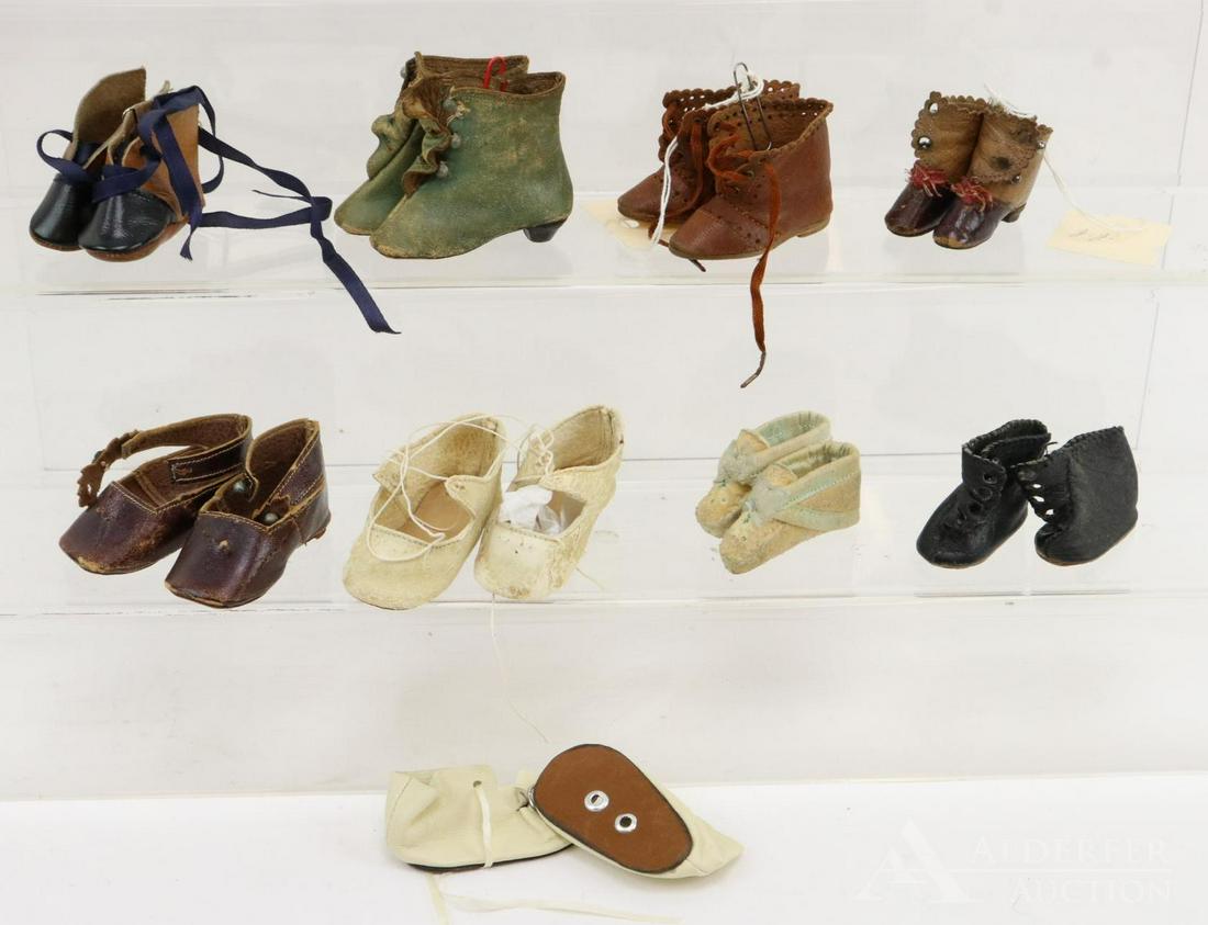 LOT OF ANTIQUE/VINTAGE DOLL SHOES.: Lot of (9) prs. of leather shoes/boots. 2" J.J. brown leather heeled boots. 2 3/4" "3 1/2" Keystone Turquoise heeled boots. 2 1/2" T / 7 Brown boots. 2 1/4" Black/brown and 1 3/4" black boots. Shoes -