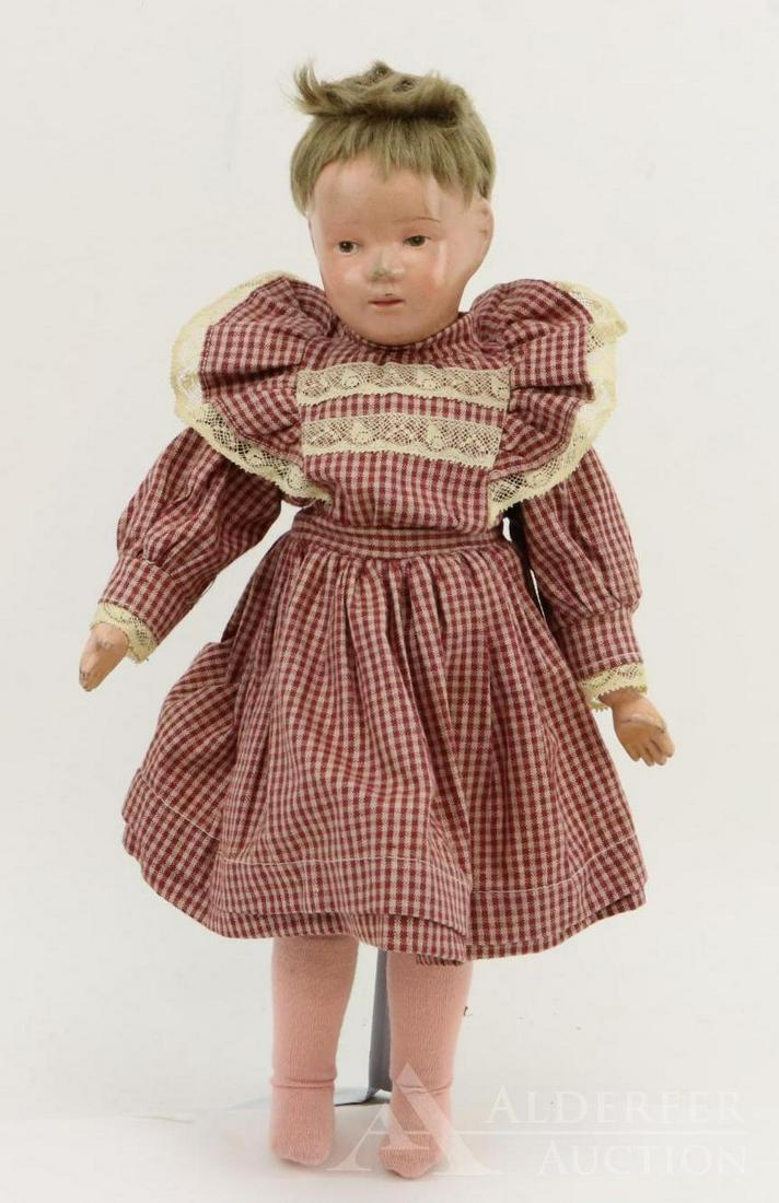SCHOENHUT LOT.: 15" Model No. 312. Doll has the incised mark on back of torso. Brown integlio eyes, original tosca mohair wig. Original factory UNION SUIT. Newer dress, socks. Antique petticoat. NO shoes. Stand. Cond